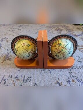 Pair of Vintage‎ Spinning Globe Bookends With Orangey Wood Base